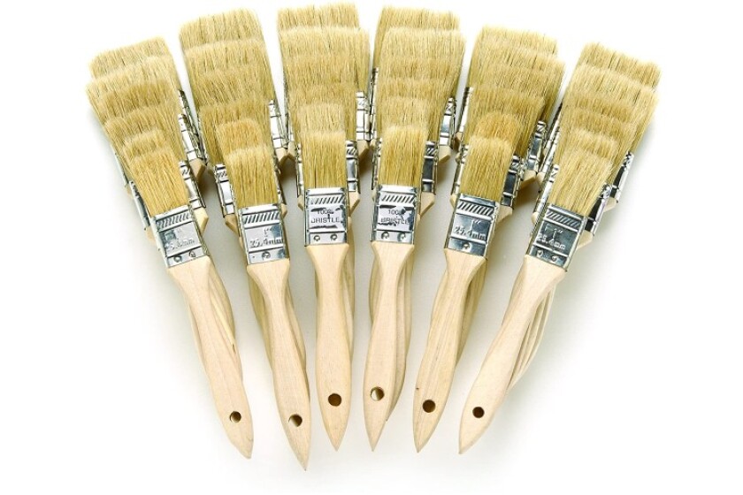selection of brushes for painting on and in boats in St Lucia